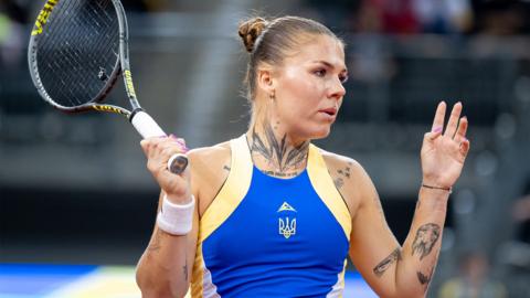 Oleksandra Oliynykova of Ukraine competes in the Billie Jean King Cup Qualifiers, women's singles tennis match against Poland at the PreZero Arena in Gliwice, Poland, on April 11, 2026. (Photo by Marcin Golba/NurPhoto via Getty Images)