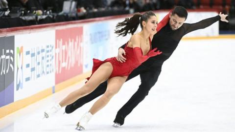 Lilah Fear and Lewis Gibson skating