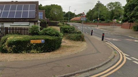 Google street view of Cathwaite - a yellow road sing can be seen near a footpath.