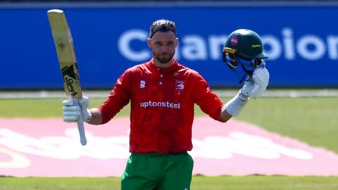 Peter Handscomb acknowledges the crowd on reaching 100 during the Metro Bank 1 Day Cup match between Leicestershire Foxes and Glamorgan