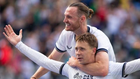 Mads Frokjaer and Will Keane celebrate for preston