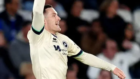 Millwall's Macaulay Langstaff celebrates against Leicester