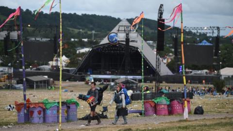 Revellers depart Glastonbury Festival in 2019