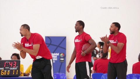 NBA Africa players cheering during a game