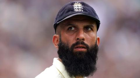 Moeen Ali looks on during the fourth England and India Test at The Oval