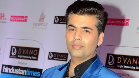Indian Bollywood film director and producer Karan Johar poses as he attends the HT Mumbai's Most Stylish Awards 2015 ceremony in Mumbai late March 26, 2015.