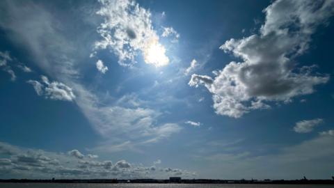 clouds building above the sea 