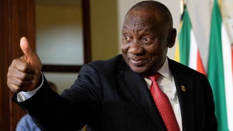 South Africa's President Cyril Ramaphosa gestures to a journalist after a media briefing, at the Union Building in Pretoria, South Africa, September 13, 2024