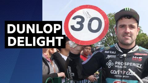 Michael Dunlop celebrates his 30th Isle of Man TT victory