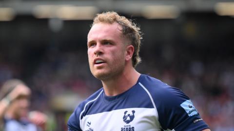 James Williams standing on the pitch during a match last season 