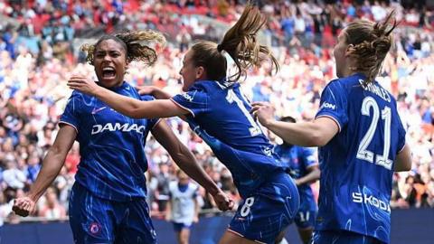 Chelsea players celebrate going 2-0 up