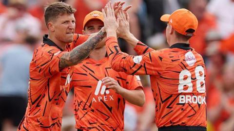 Sunrisers Leeds Brydon Carse and Harry Brook celebrate