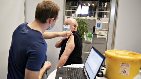 A man is vaccinated in Frederikshavn, Jutland, Denmark