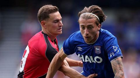 Jack Clarke of Ipswich takes on Jorge de Frutos of Rayo Vallecano