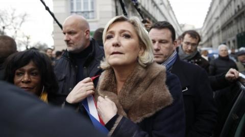National Front leader Marine Le Pen (centre) at a protest march in Paris, France. Photo: 28 March 2018