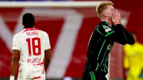 tephen Welsh (R) of Celtic reacts during the UEFA Champions League group F soccer match between RB Leipzig and Celtic Glasgow in Leipzig, Germany