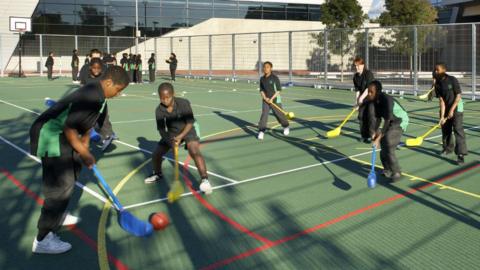 Young people playing sports