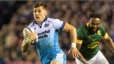 Tom Jordan carrying the ball for Scotland against South Africa