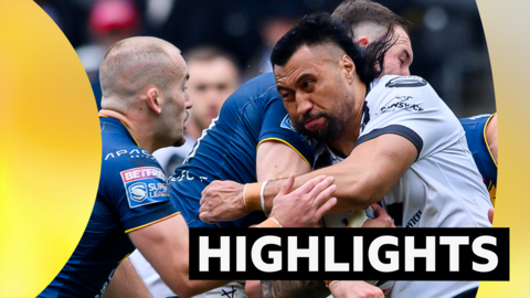 Hull FC's Ligi Sao is tackled by Leeds' Cameron Smith & Tom Holroyd
