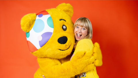 Pudsey Bear and Sara Cox.
