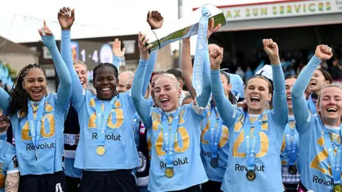 Man City players celebrate