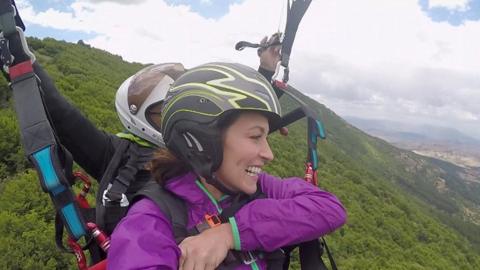 BBC's Travel Show's Amanda Ruggeri paragliding in Krusevo, Macedoina