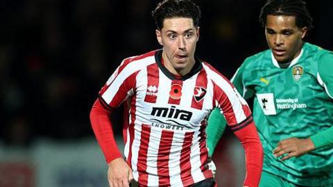 Cheltenham Town's on-loan Bristol Rovers player Isaac Hutchinson