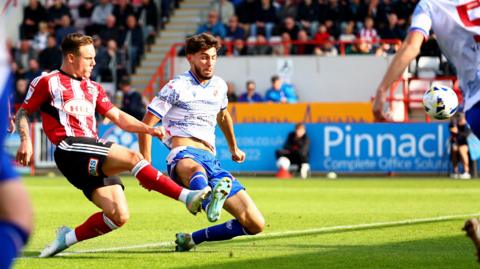 Jayden Wareham scores his 11th-minute goal that cancelled out Reading's early opener