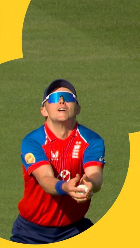 Sam Curran catching a ball as England play India in the men's international T20.