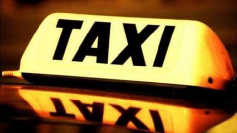 General view of a taxi sign
