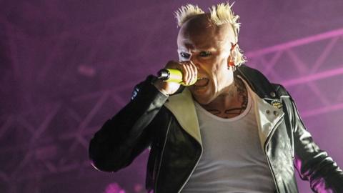 Keith Flint performing on stage