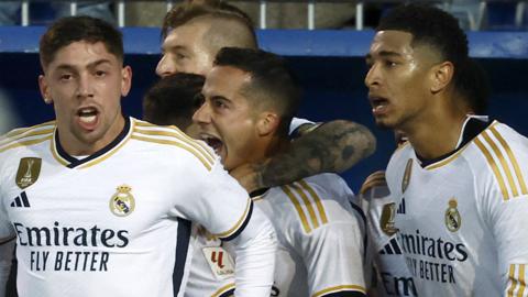 Real Madrid celebrate scoring against Alaves