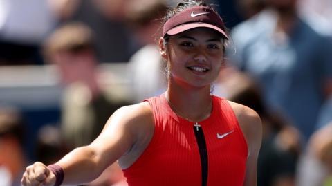 Emma Raducanu celebrates her first-round victory at the US Open in September