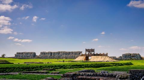 A wooden gate on the spot where the Romans invaded