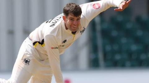 Ed Middleton bowling for Gloucestershire