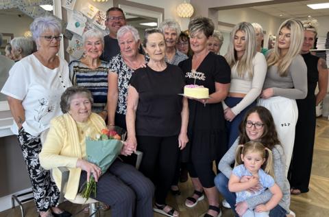 Friends, family and customers of Sandra Handel gather round her for a group photo as she retires from her hairdressing salon in Highbridge