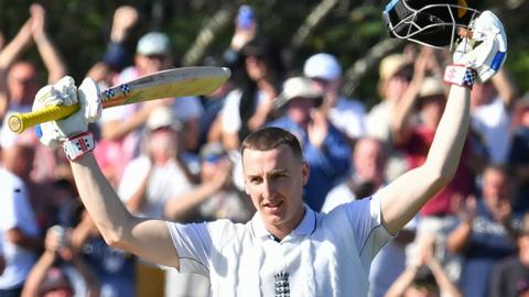 Harry Brook celebrates his century