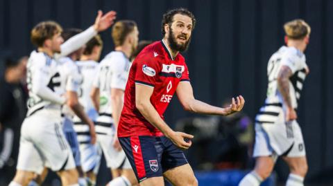 Ross County's Alex Iacovitti looks frustrated
