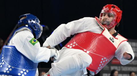 Matt Bush competing in Para-taekwondo