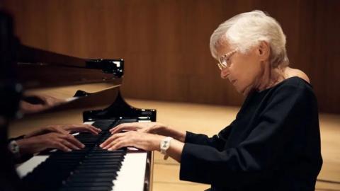 Ruth Slenczynska, pictured at the age of 97, plays the piano in a wood-lined recording studio