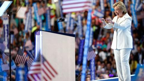 Democratic presidential candidate Hillary Clinton acknowledges the crowd as she arrives on stage during the fourth day of the Democratic National Convention at the Wells Fargo Center, 28 July 2016 in Philadelphia.