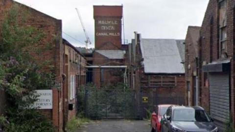 Google Street View image of the exterior of the Canal Mills building