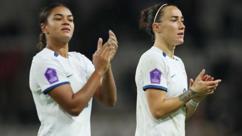 Lucy Bronze and Jess Carter