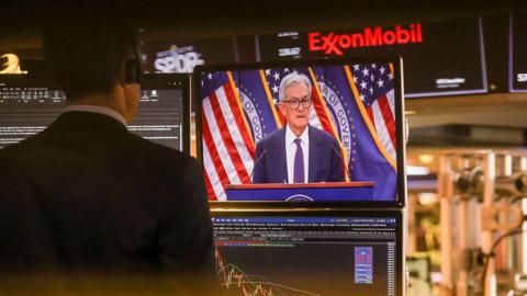A livestream shows Jerome Powell, chairman of the US Federal Reserve, speaking after a Federal Open Market Committee (FOMC) meeting on the floor of the New York Stock Exchange (NYSE) in New York, US, on Wednesday, Jan. 28, 2026.