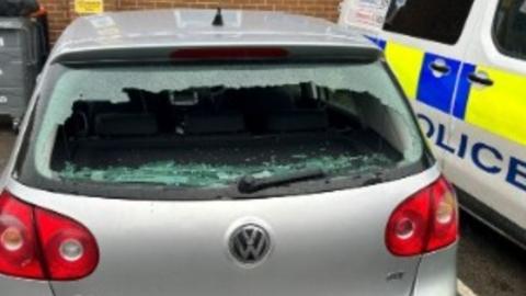 Car with smashed rear window