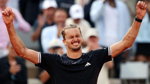 Alexander Zverev of Germany celebrates victory over Flavio Cobolli of Italy