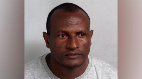 Custody shot of Hadush Kebatu