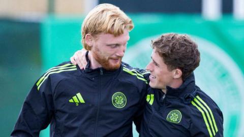 Celtic's Liam Scales and Luke McCowan embrace