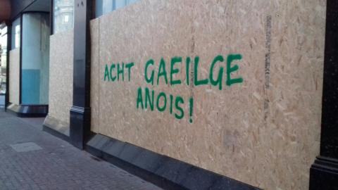 Graffiti in Belfast calling for an Irish language act,