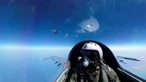 A pilot is photographed operating an aircraft of the Air Force under the Eastern Theatre Command of China's People's Liberation Army during a combat readiness patrol and "Joint Sword" exercises around Taiwan, at an undisclosed location in this handout image released on 8 April 2023.